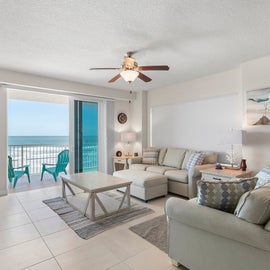 Spacious living room with direct ocean views