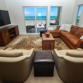 The Living Room with a Sectional & Two Accent Chairs